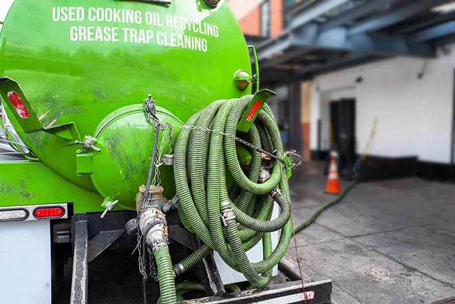 maintenance crew pumping grease trap at a fast food restaurant in Morongo Valley